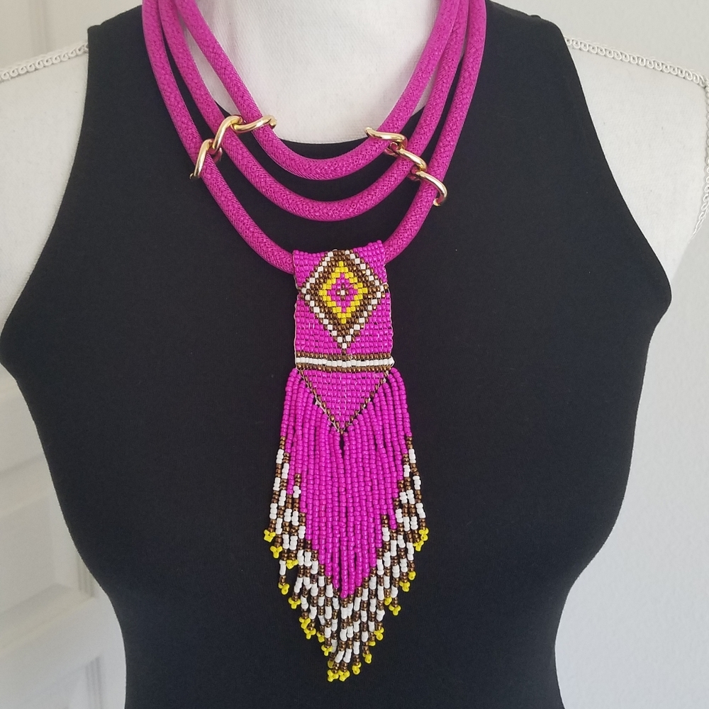 Bright pink handmade necklace.